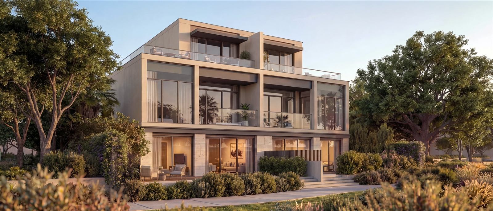 Three-storey townhouses at The Terraces with balconies and landscaped gardens